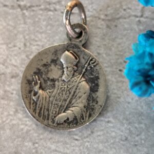 Rare antique médaille religieuse de saint ortaire par karo de couleur argent et de la vierge Marie.