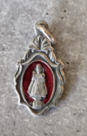 Ancienne médaille religieuse de Jésus de Prague.